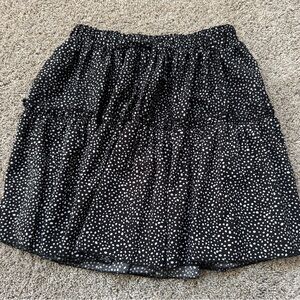 Black skirt with white polka dots